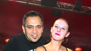 Swinger riding a dick in club