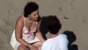 Tongue kissing at the beach